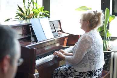Student performing piano on recital